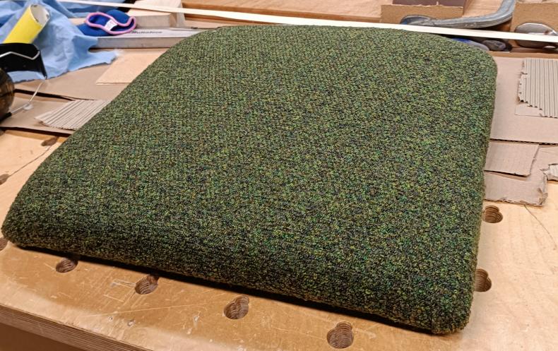 Upholstery for the seat. Went with moss green on darkish red stain. Works well, very happy.